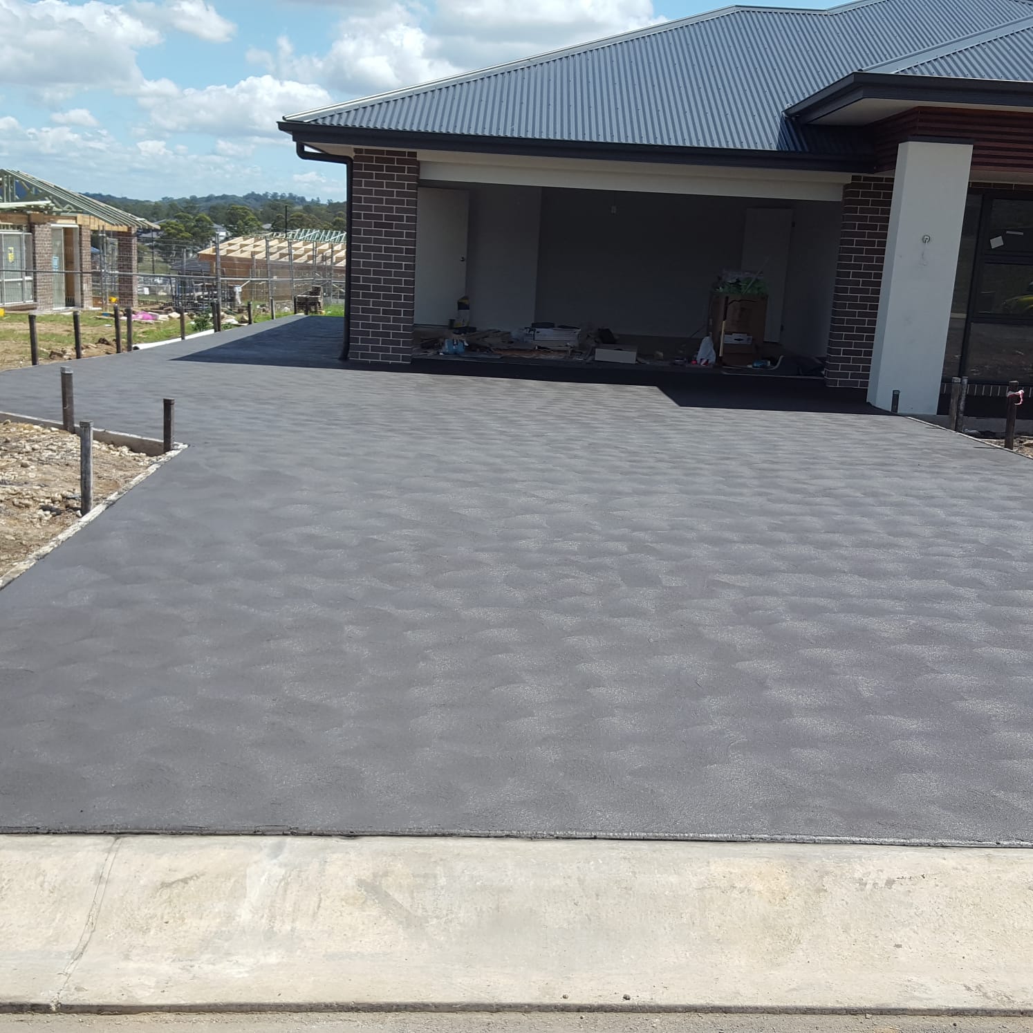 Modern geometric pattern concrete driveway